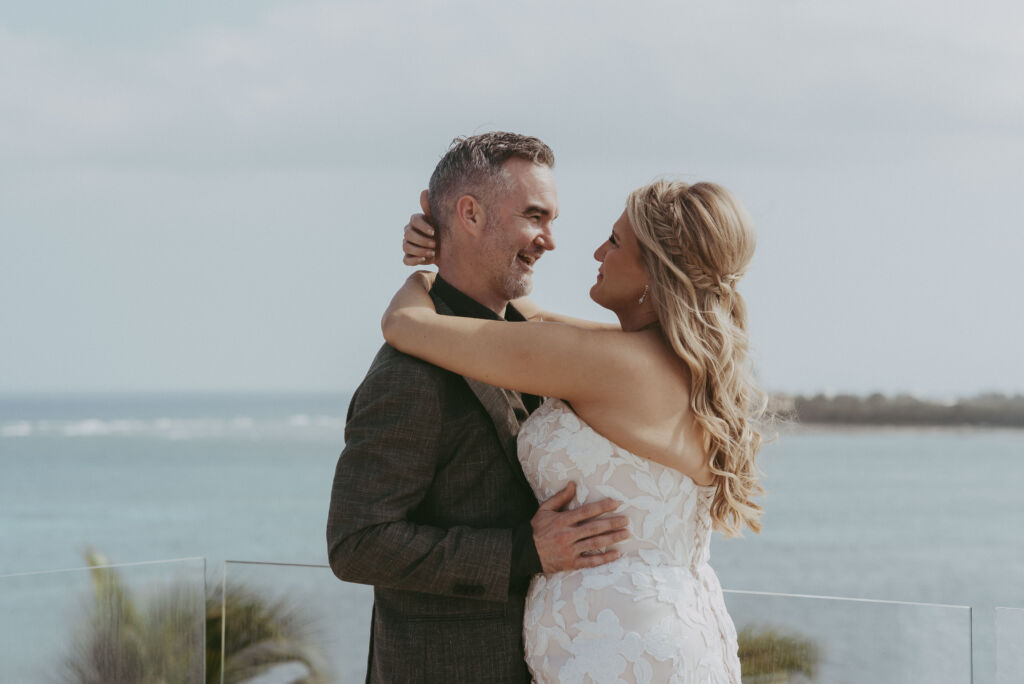 Half up bridal hairstyle for a tulum wedding by Sarah Garnier & Co.